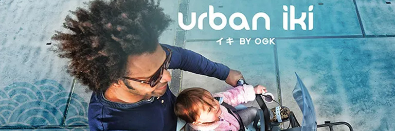 Urban Iki lifestyle image of man and child on a bike